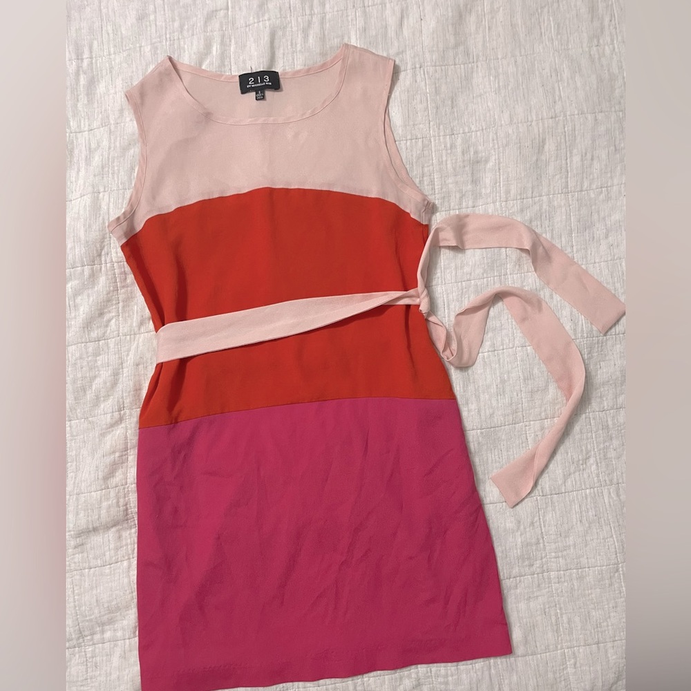 A pink color lock dress with optional tie